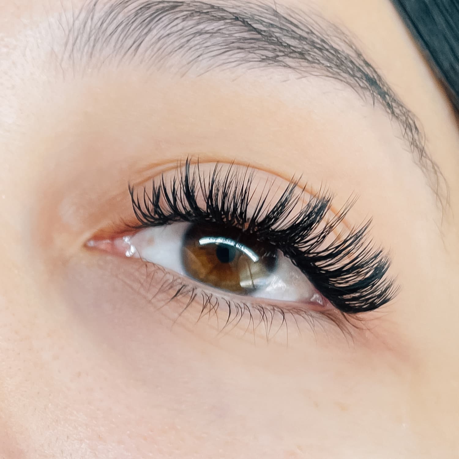 "A closeup of an eye with lash extensions. Lashes performed by Lexi, an eyelash artist in American Fork, UT.